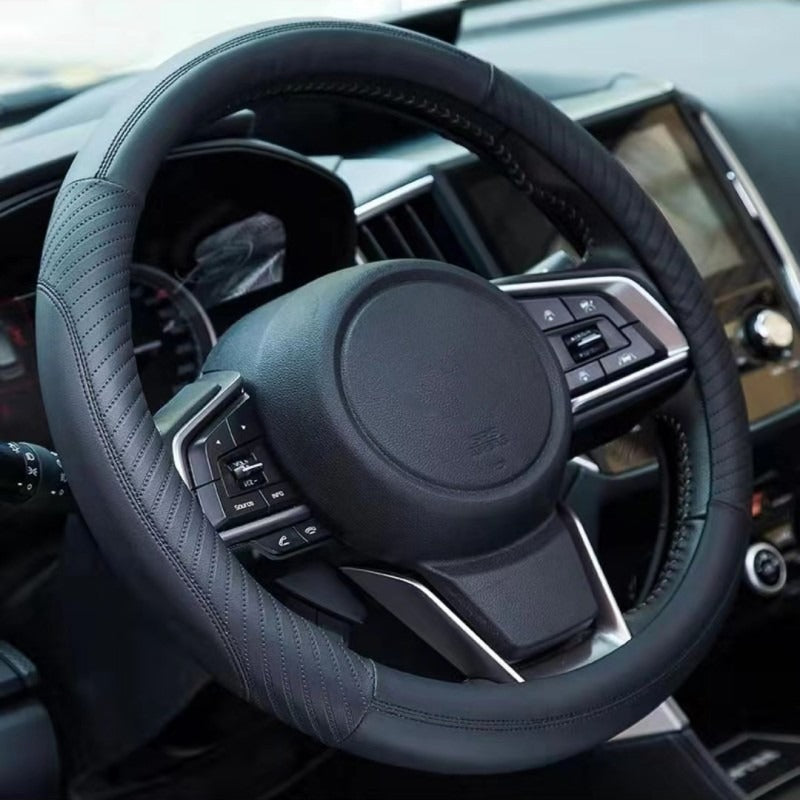 🔥Poťah na volant z pravej kože - univerzálny poťah na volant do auta, protišmykový, odolný