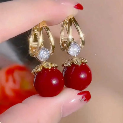 【Compre uno y llévese otro gratis】 Pendientes de plata con perlas de lujo francés de nuevo estilo 2025